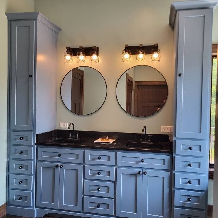 Custom double sink bathroom vanity with tall cabinets in Valparaiso, Indiana